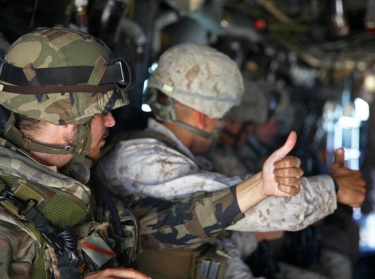 U.S. and Spanish Marines signal acknowledgement