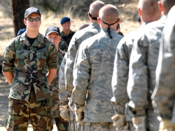 U.S. Air Force Academy Cadet 1st Class Randall Chlebek prepares basic cadets to begin the assault course during the field training portion of basic training