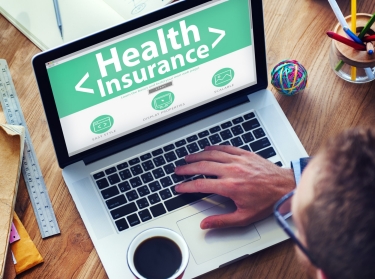 A consumer signs up for health insurance online