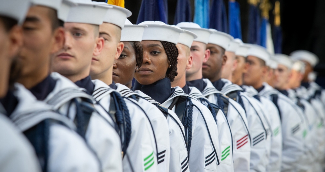 Sailors assigned to the U.S. Navy Ceremonial Guard wait to parade the colors at the U.S. Navy Memorial in Washington, D.C. during a Concert on the Avenue, June 11, 2019