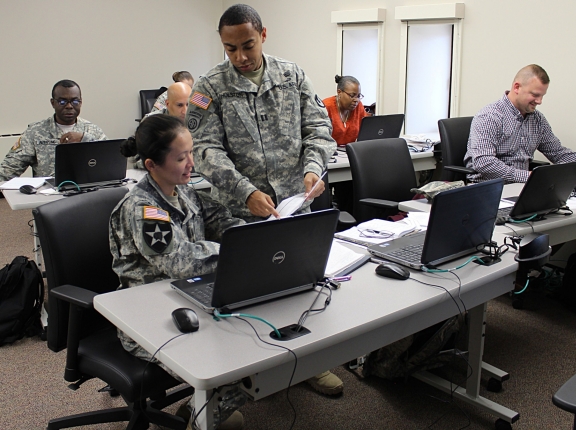 Army Contracting Command-New Jersey's Maj. Bonny Dylewski and Capt. Reginald Gholston take part in the contingency contracting administration services mission training Oct. 29, photo by U.S. Army