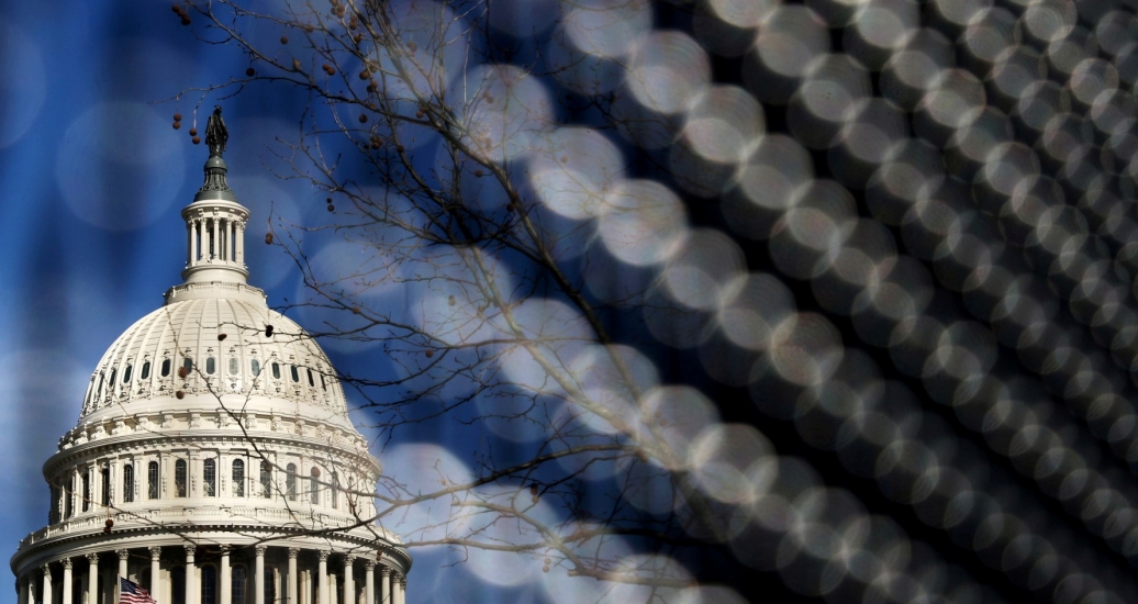 Light catches the security fence around the U.S. Capitol, which was erected in the wake of the January 6th attack, in Washington, D.C., March 15, 2021