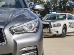 A police vehicle stops a sedan on a routine traffic stop photo by ASP Inc/Adobe Stock