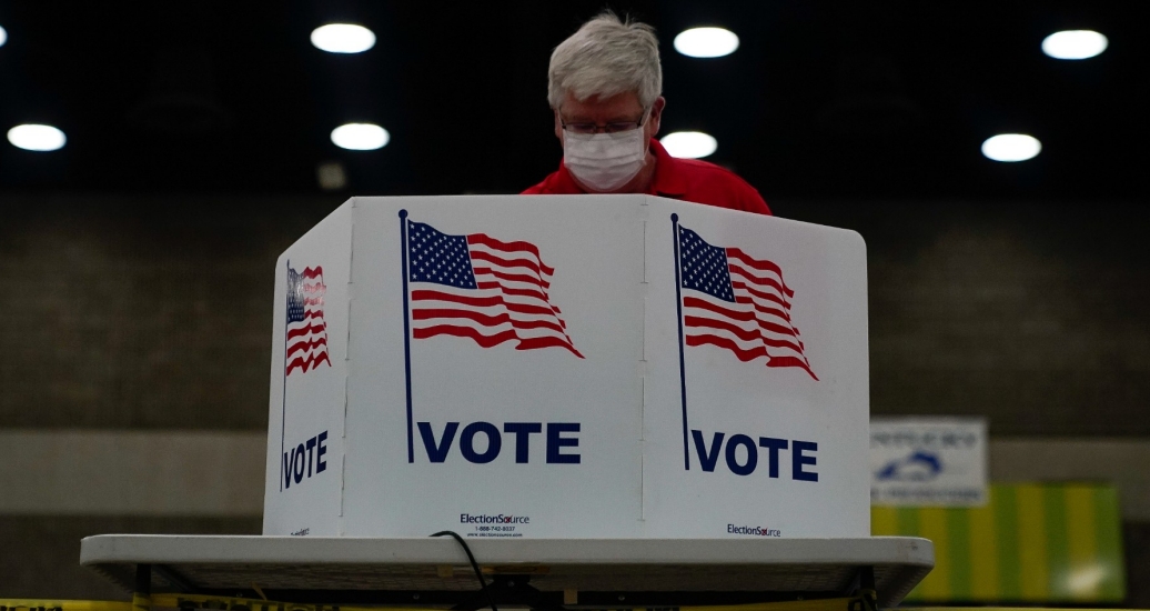 A voter completes his ballot on the day of the primary election in Louisville, Kentucky, U.S. June 23, 2020