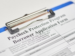 Paycheck Protection Program borrower application form, photo by golibtolibov/Getty Images