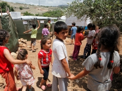 Syrian refugee children in the Ketermaya refugee camp, outside Beirut, Lebanon on June 1, 2014, photo by Dominic Chavez/World Bank