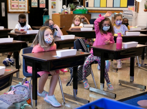 Students return to school wearing masks at Wilder Elementary School in Louisville, Kentucky, August 11, 2021