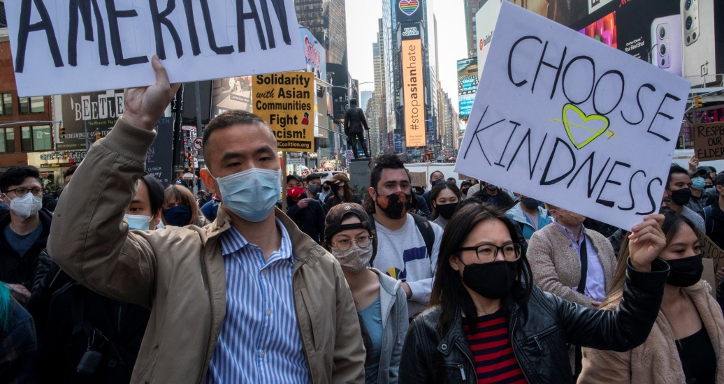 People take part in a Stop Asian Hate rally at Times Square in New York City, April 4, 2021