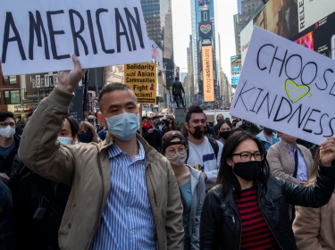 People take part in a Stop Asian Hate rally at Times Square in New York City, April 4, 2021, photo by Eduardo Munoz/Reuters