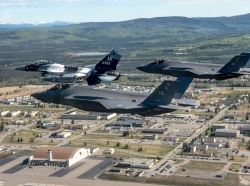An F-16 Fighting Falcon an F-35A Lightning II from Eielson Air Force Base and an F-35A from Hill Air Force Base, Utah, fly over the installation in Alaska, May 15, 2020. With the arrival of the F-35As, the 354th Fighter Wing is now home to fourth and fifth-generation fighter aircraft, photo by Tech. Sgt. Jerilyn Quintanilla/U.S. Air Force