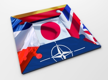 Puzzle pieces representing the flags of Japan, France, Germany, the UK, and NATO, images by numax3d, railwayfx/Adobe Stock 