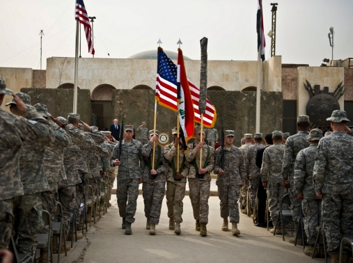 The colors are retired during a ceremony marking the end of the U.S. mission in Iraq, Baghdad, December 15, 2011