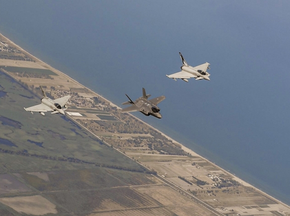 Italian air force F-35 and Eurofighter Typhoons fly in formation over Italy during a training mission, courtesy photo, U.S. Air Forces in Europe and Air Forces Africa