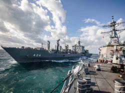 The USS John S. McCain conducts a replenishment-at-sea with the Japan Maritime Self-Defense Force fast combat support ship JS Omi, November 28, 2020, photo by MC2 Markus Castaneda/U.S. Navy