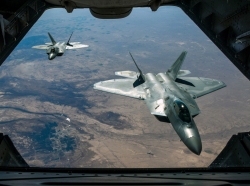 Two Air Force F-22 Raptors fly over Syria, February 2, 2018, while supporting Operation Inherent Resolve, photo by Staff Sgt. Colton Elliott/Air National Guard