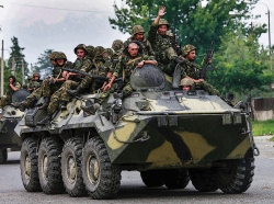 Russian soldiers aboard an armoured vehicle in western Georgia in AUgust of 2008