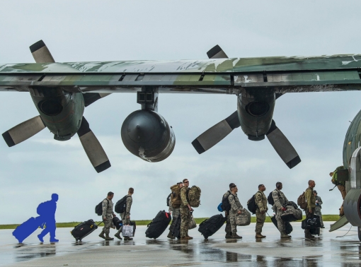 U.S. Air Force Airmen board a Japan Air Self-Defense Force C-130H Hercules from the 401st Tactical Airlift Squadron, Japan, at Andersen Air Force Base, Guam, Feb 25, 2019. The Airmen took part in COPE North which was an annual multilateral U.S. Pacific Air Forces-sponsored field training exercise focused on combat air forces large-force employment and mobility air forces humanitarian assistance and disaster relief training to enhance interoperability among U.S., Australian and Japanese forces, photo by Senior Airman Xavier Navarro/U.S. Air Force