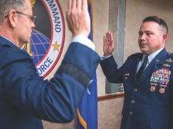 Col. Darren Brumfield, right, Air Force Global Strike Command chief of intercontinental ballistic missile (ICBM) and helicopter maintenance division, recites the oath of office during his promotion ceremony at Barksdale Air Force Base, La., Nov. 30, 2020. The oath of office cites, Air Force officers will support and defend the Constitution of the United States against all enemies, foreign and domestic, photo by Staff Sgt. Philip Bryant/U.S. Air Force
