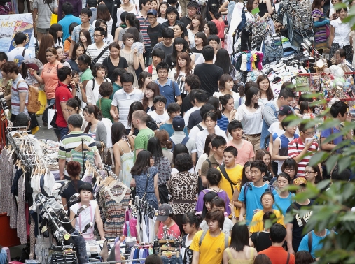 A throng of shoppers in Myungdong, downtown Seoul, South Korea, July 17, 2011