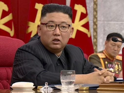 North Korean Leader Kim Jong-un speaks at a meeting of the Workers' Party of Korea