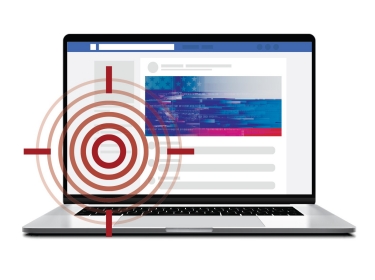 Laptop depicting Russian propaganda on Facebook with a bullseye mark, images by guteksk7, iiierlok_xolms, carmelod, and FishPouch/Adobe Stock