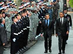 Presidents Barack Obama and Nicolas Sarkozy at a ceremony honoring service members who supported the international response to the unrest in Libya, at Cannes City Hall, November 4, 2011, photo by MC2 Stephen Oleksiak/U.S. Navy