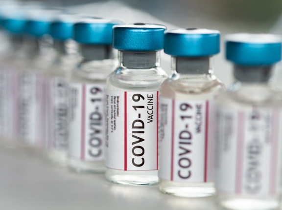 Vials of COVID-19 vaccine, photo by MarsBars/Getty Images