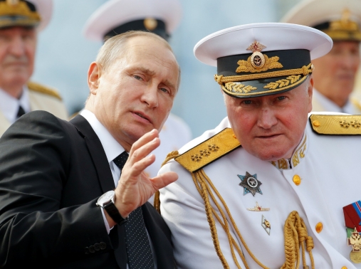 Vladimir Putin speaks with Commander-in-Chief of the Russian Navy Admiral Vladimir Korolev, St. Petersburg, July 30, 2017