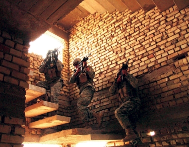 Soldiers entering building