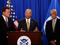 Dept. of Homeland Security Secretary Jeh Johnson and former DHS secretaries Michael Chertoff (R) and Tom Ridge (L) speak to reporters on the need for Congress to pass a full-year appropriations bill for the Homeland Security Department in February 2015