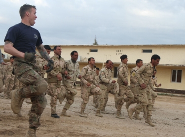 Iraqi soldiers perform physical training with 82nd Airborne