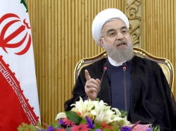 Iranian President Hassan Rouhani speaks in Tehran after returning from the annual UN General Assembly, September 29, 2015