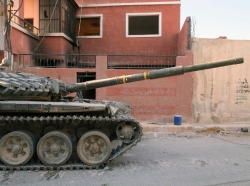 A tank of the Syrian National Army in the outskirts of Damascus on September 21, 2013