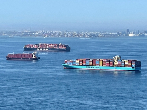 Container ships wait off the coast of the congested Ports of Los Angeles and Long Beach in Long Beach, California, October 1, 2021