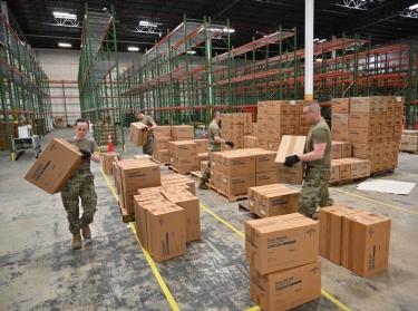 Members of the Maryland National Guard load medical supplies and equipment at the Maryland Strategic National Stockpile location on March 19, 2020, photo by MSgt. Christopher Schepers/U.S. Air National Guard