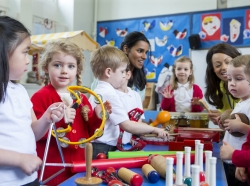 Nursery children playing with musical instruments in the classroom