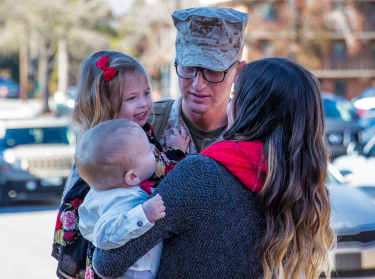 U.S. Marine Corps Lance Cpl. Samuel Taylor, combat videographer, with Headquarters Battalion, 2nd Marine Division returns from deployment at Camp Lejeune, N.C., Dec. 19, 2017, photo by Lance Cpl. Tanner Seims/U.S. Marine Corps