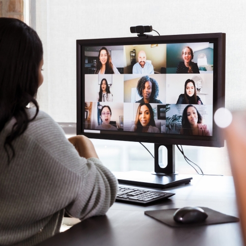 Woman meets with clients virtually