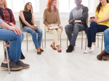 People sitting together in a discussion