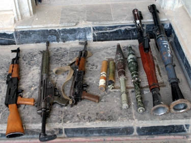 Small arms and rocket-propelled grenades found by Marines from Bravo Company, 1st Battalion, 3rd Marine Regiment in a house in Fallujah