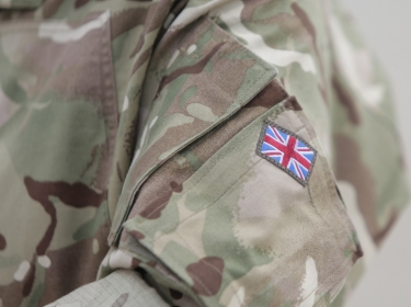 Union Jack on British soldier's uniform, photo by MoiraM/Adobe Stock