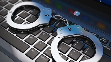 Handcuffs on keyboard